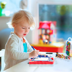 Lollipop easy-erase slide quickly resets the board for new creations.