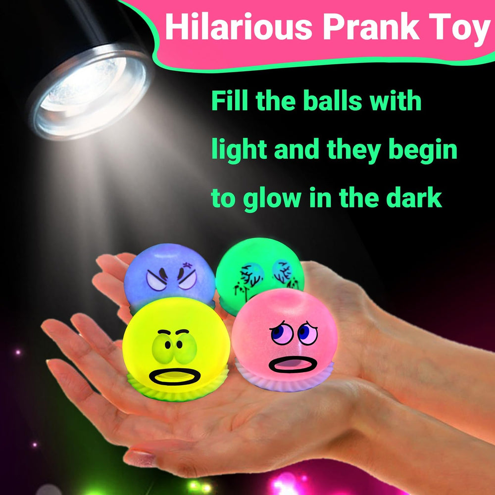 Lomkiwe slime ball glow on dark surfaces with a funny face.
