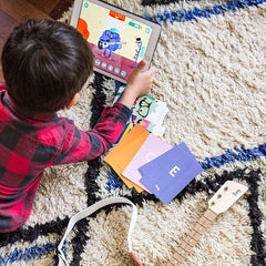 Loog Mini low-action strings make fretting comfortable for small hands