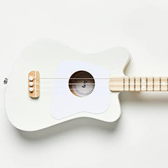 Loog Mini wood grain close-up emphasizes natural tone and build quality.