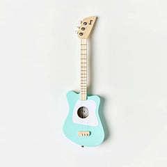 Loog Mini wooden body close-up highlights compact size for small hands