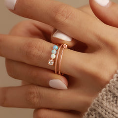 LOVECOM model wearing the rose gold opal fidget ring for daily wear.