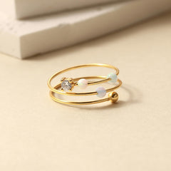 LOVECOM ready-to-gift packaging featuring the opal fidget ring.