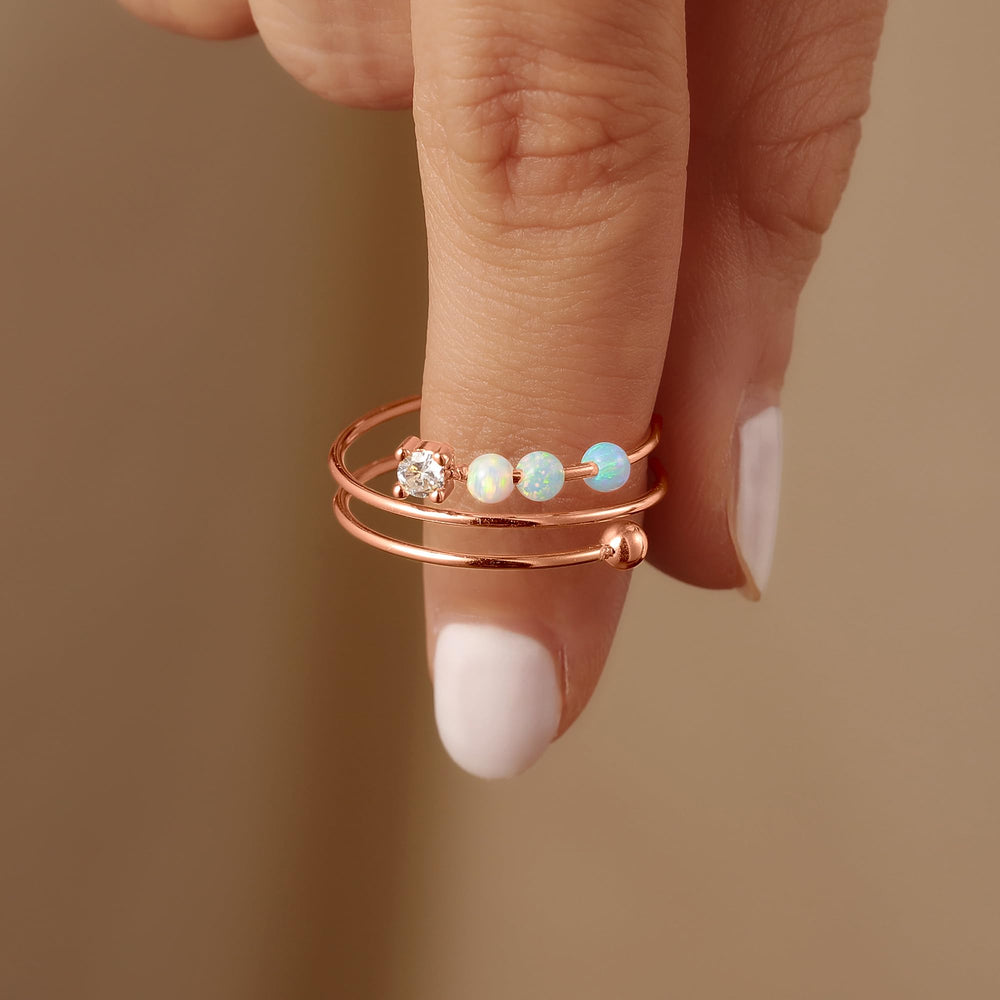 LOVECOM S925 sterling silver base with rose gold plating shown in adjustable open ring.
