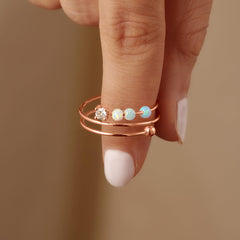 LOVECOM S925 sterling silver base with rose gold plating shown in adjustable open ring.