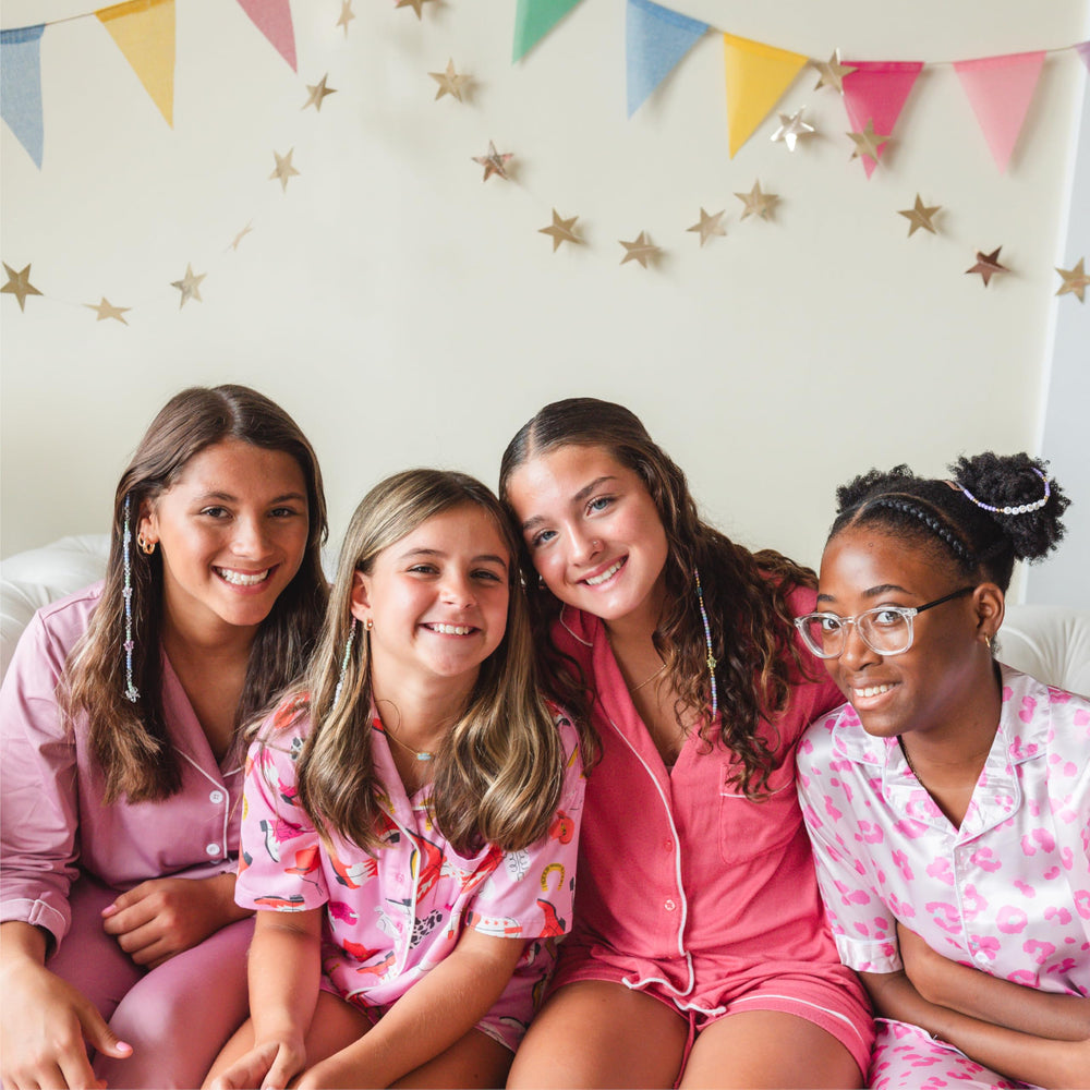Loveté Hair Charm Kit party setup showing group activity and creativity