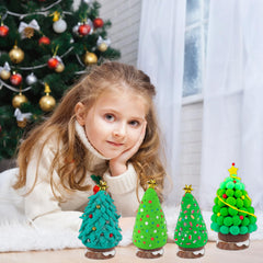 LULEEYANG kids displaying finished trees after completing the project.