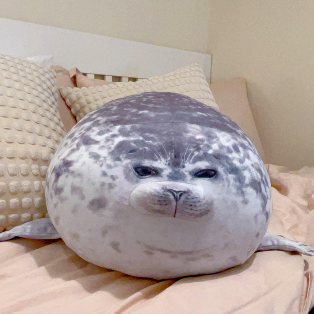 LUXSIT seal pillow nap-time setup, decorative and cozy on a couch