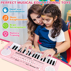 M SANMERSEN piano with microphone in pink supports singing while playing