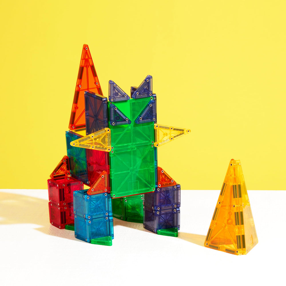 Bright MAGNA-TILES pieces encouraging color recognition and exploratory play.