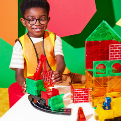 MAGNA-TILES Builder XL truck cabs enable tall, multi-vehicle configurations.