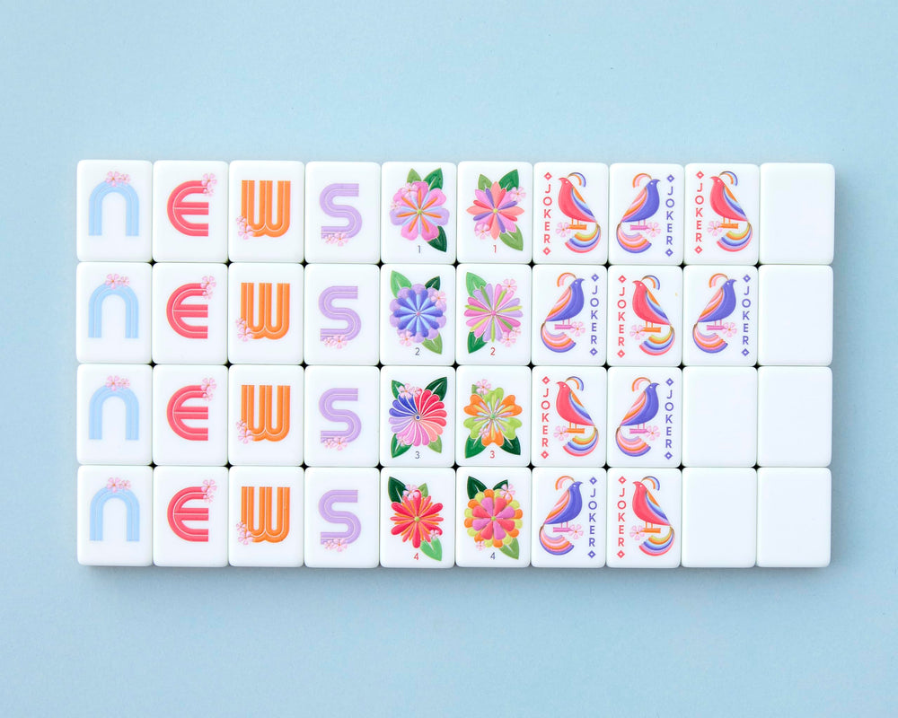 Paradise tiles tucked into the included bag offer safe storage and easy transport.