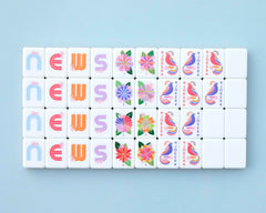 Paradise tiles tucked into the included bag offer safe storage and easy transport.