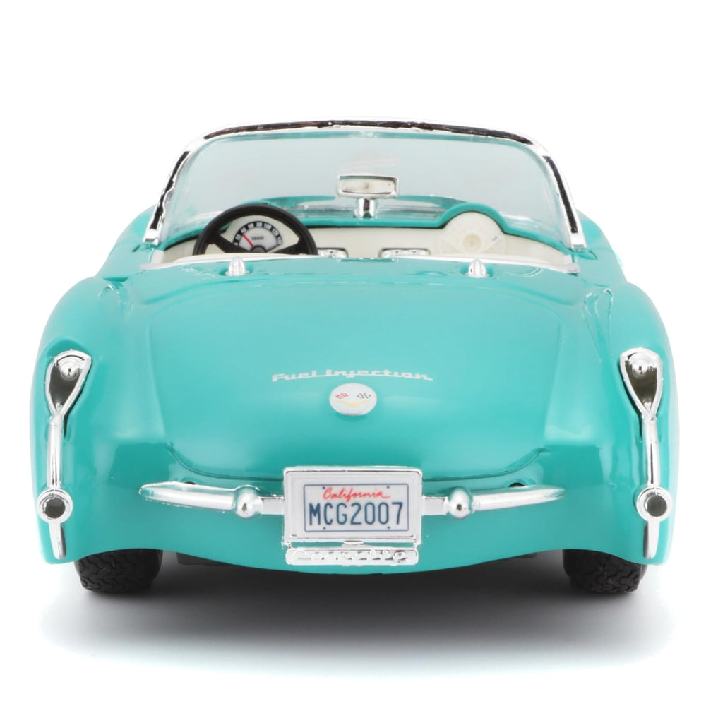 Maisto 1:24 Corvette turquoise engine compartment showcases accurate detailing.