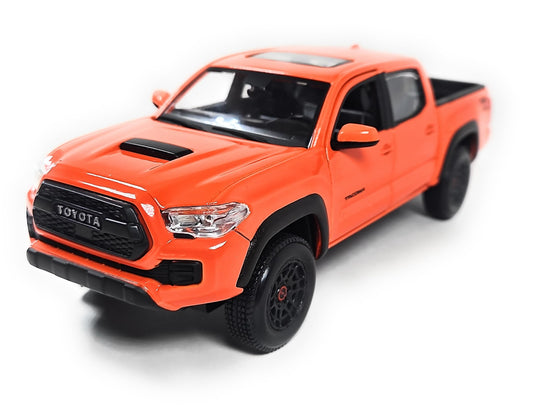 Maisto 1:27 Tacoma TRD Pro Solar Octane Orange, front view highlighting bold color and collectible appeal