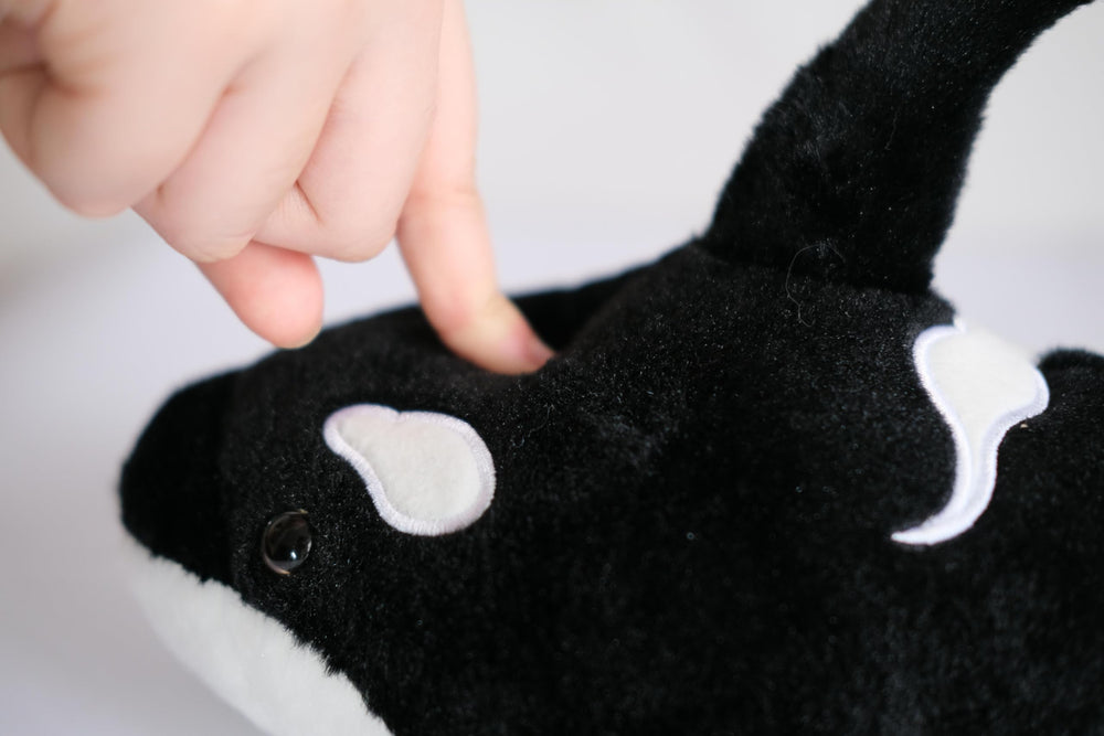 Make My Day orca plush surface washable for easy cleanup after adventures.