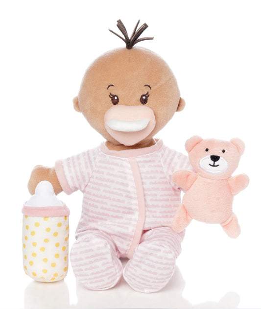 Manhattan Toy Wee Baby Stella Sleepy Time Beige doll in striped pajama, perfect for bedtime role play.