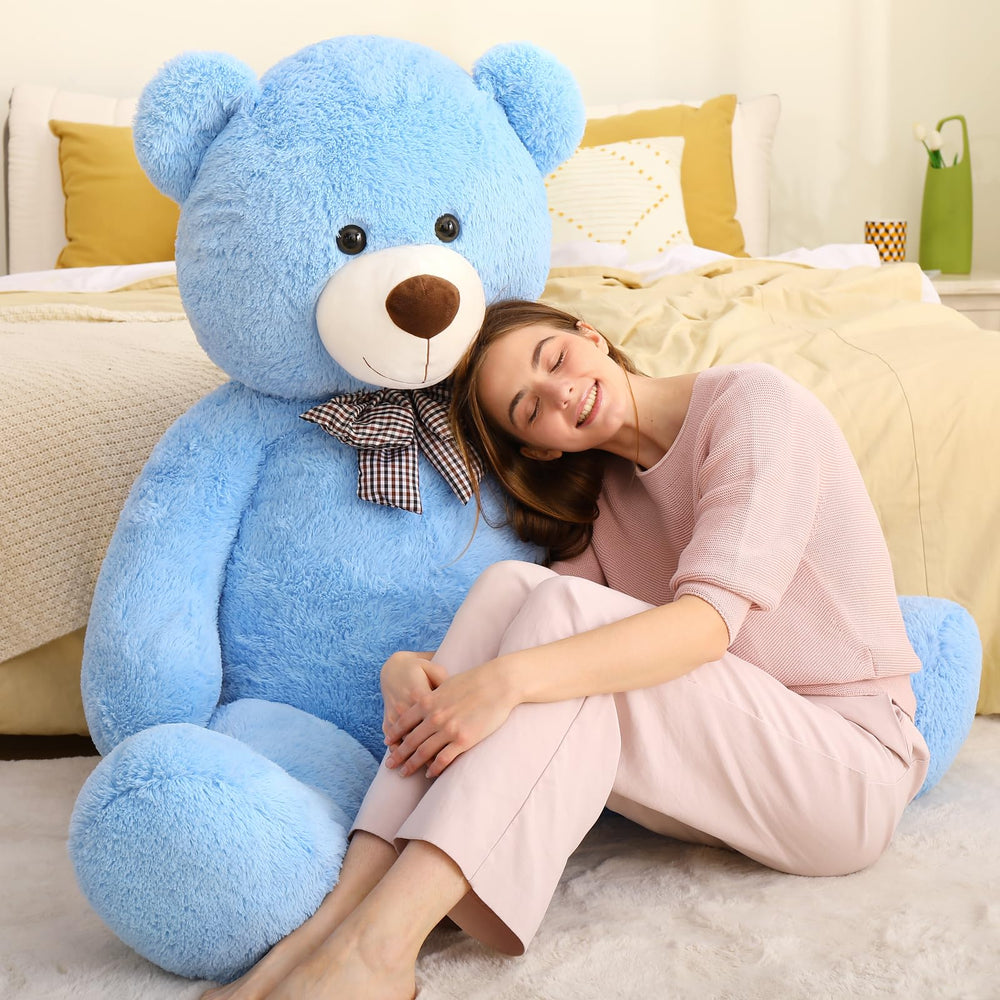 MaoGoLan blue teddy bear in a living room, comforting family moments.