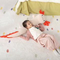 MaoGoLan axolotl pillow on bed adding playful warmth