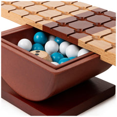 Marbles on the balance beam in Rock Me Archimedes demonstrating precision