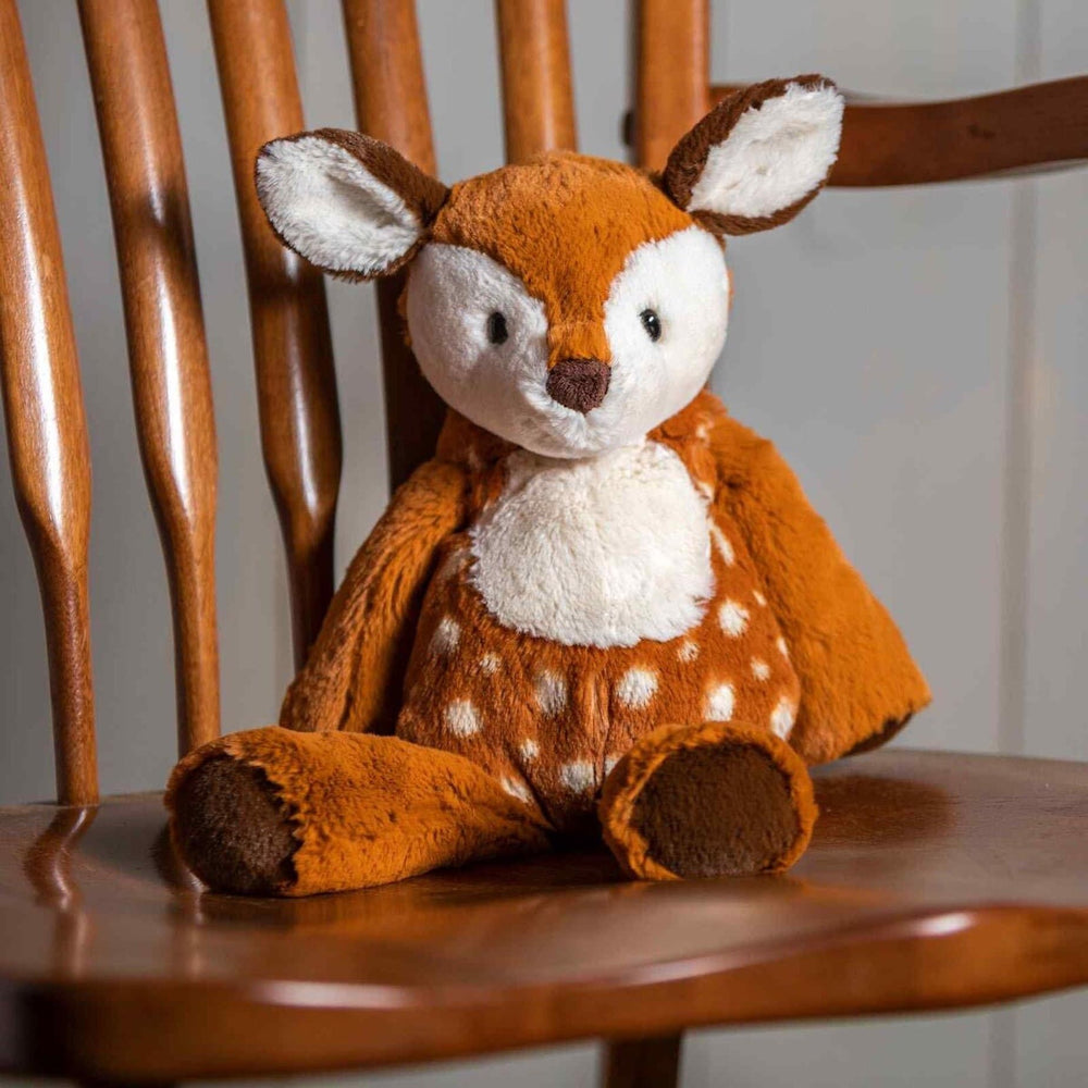 Weighted bum and feet on Mary Meyer Marshmallow Zoo Fawn for comforting snuggles.