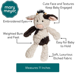 Mary Meyer Putty Nursery Cow textured fabric invites tactile exploration for babies.