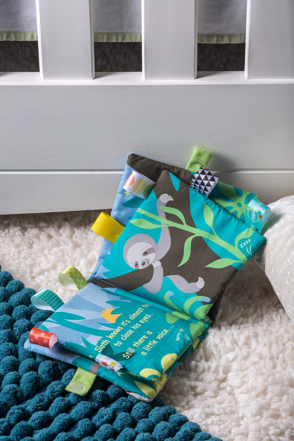 Mary Meyer Taggies compact 6x6 inch cloth book fits tiny hands.
