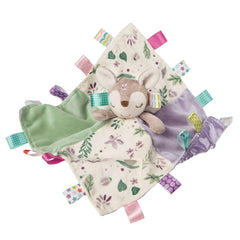 Mary Meyer Taggies Flora Fawn toy on a blanket for soothing snuggles.
