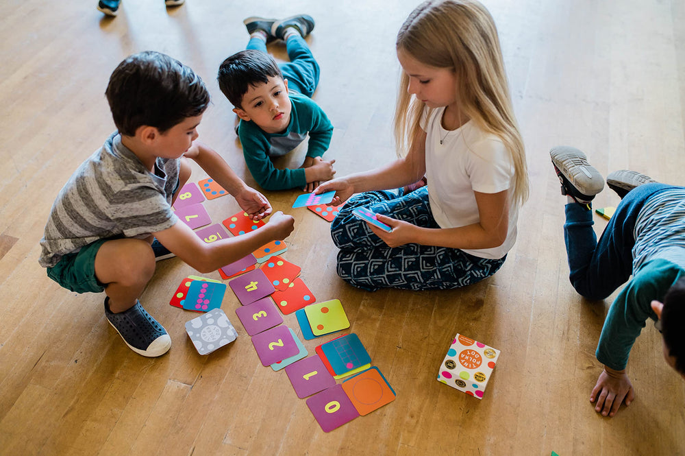 Math for Love Tiny Polka Dot storage helps families set up play anywhere.