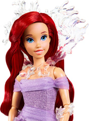 Gown detail highlights iridescent fabric on Mattel Ariel.
