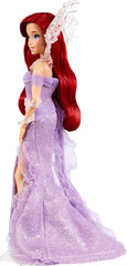 Mattel Ariel's bracelet and heels complete the look.