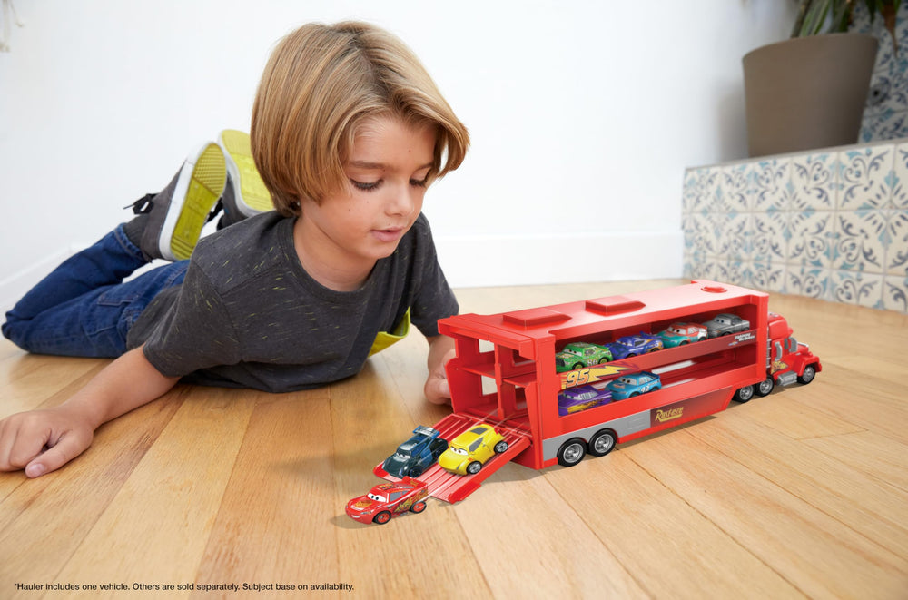Lightning McQueen mini inside hauler for easy transport and play.