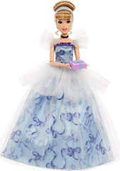 Mattel Disney Princess Cinderella doll with gift box accessory for celebrations.