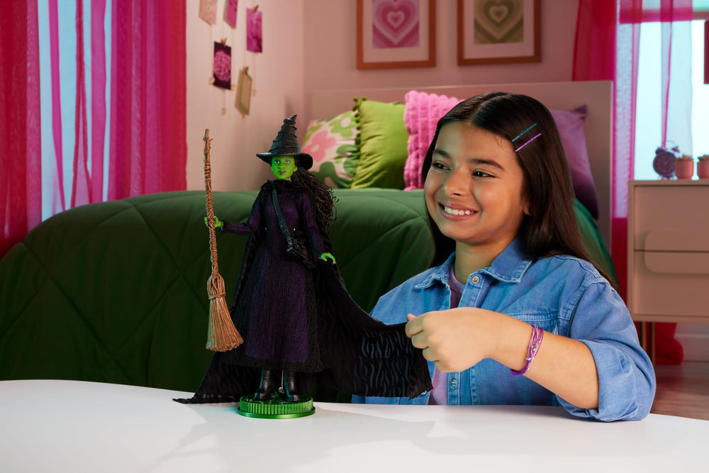Mattel Elphaba with hat, broom, and satchel enhances imaginative storytelling.
