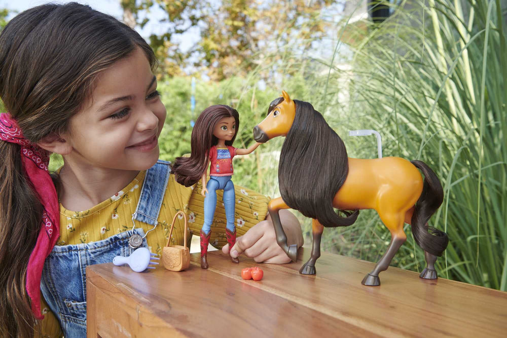 Mattel Spirit Lucky doll wearing fashion top and jeans for imaginative styling.