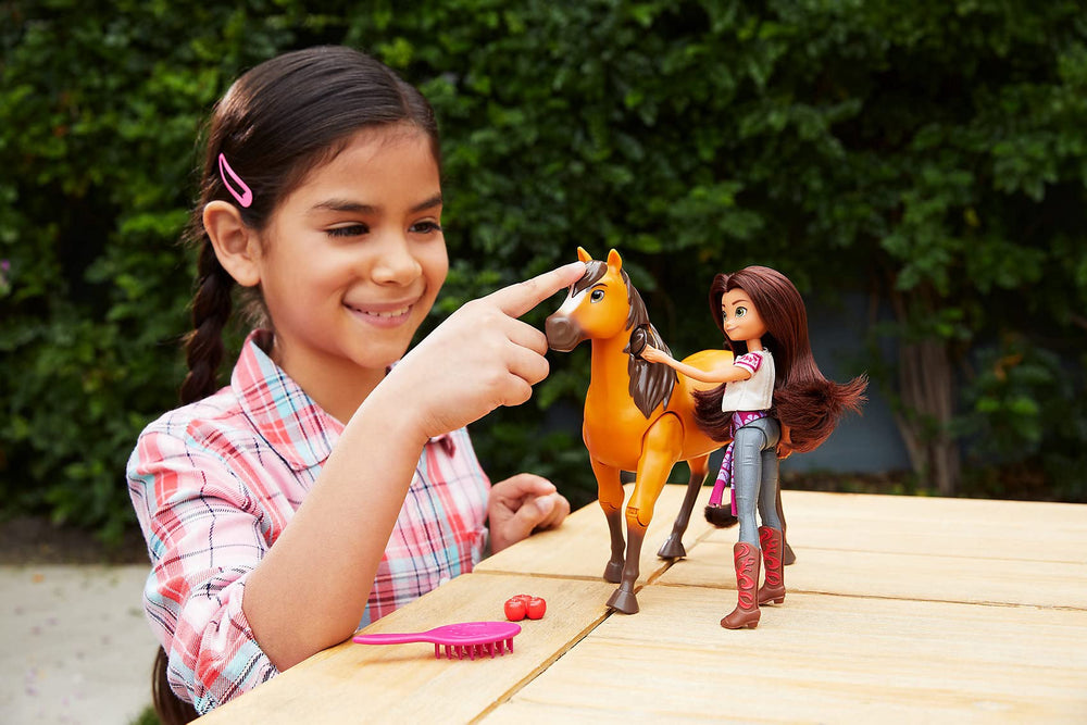 Lucky doll rides Spirit with a button-activated action, inspiring imaginative riding adventures.
