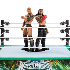 Mattel WWE Bloodline The Rock figure with articulated signature moves.