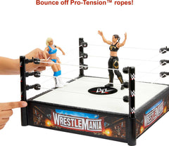 Mattel WWE Superstar Ring play setup on home table for fans.