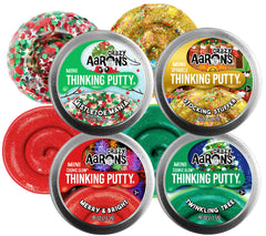 Matty's Toy Stop Crazy Aaron's Merry Bright Cosmic Glow putty in a mini tin with glow-in-the-dark fun.
