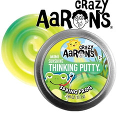 Opened tin shows soft, stretchable putty with bright spring colors.
