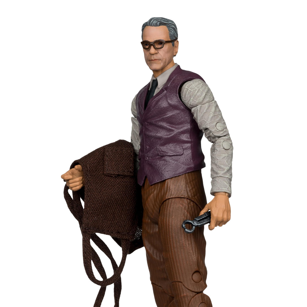 McFarlane Toys Alfred Pennyworth figure side pose highlighting articulation for dynamic posing.
