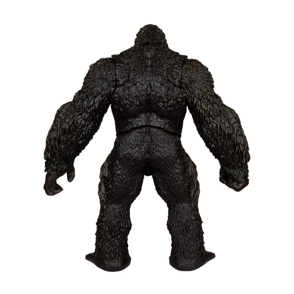 McFarlane Toys Justice League vs Godzilla vs King Kong card scene-ready art.