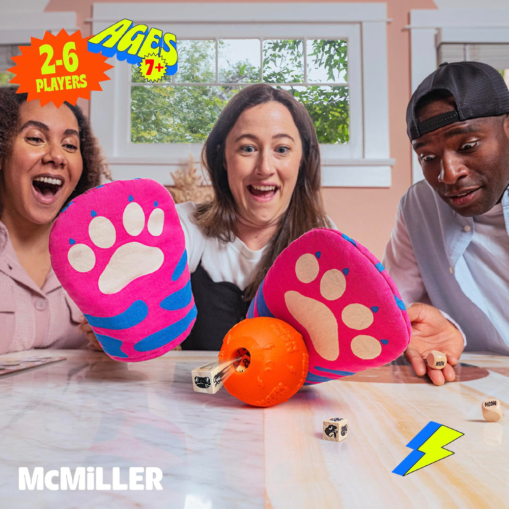 MCMILLER ENTERTAINMENT Cat Mitt Game dice and mitts on the table invite quick fun