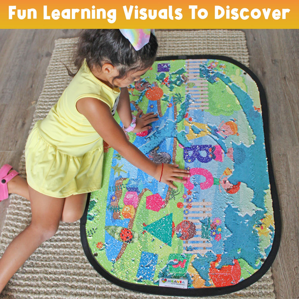 Child uses Meavia giant sequins to explore letters and shapes during play.