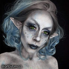 Mehron Spirit Gum elf ears adhesion highlights precise, skin-safe bonding.