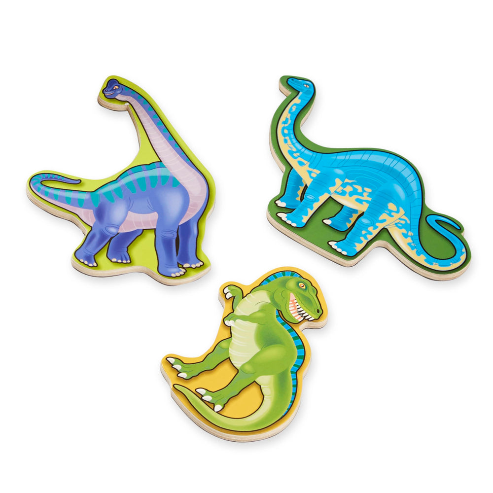Close-up of Melissa & Doug dinosaur magnets with vibrant details