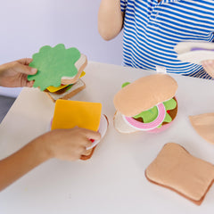 Melissa and Doug felt sandwich bread slices enable customizable pretend meals and stacking.