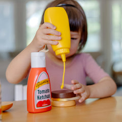 Melissa & Doug mayo and ranch bottle set supports creative sandwich pretend.