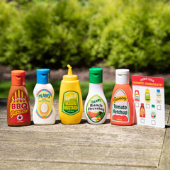 Melissa & Doug pretend picnic scene with easy-to-grip condiment bottles.