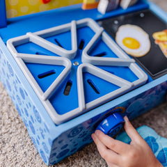Melissa & Doug reversible grill top and sink enable varied play surfaces